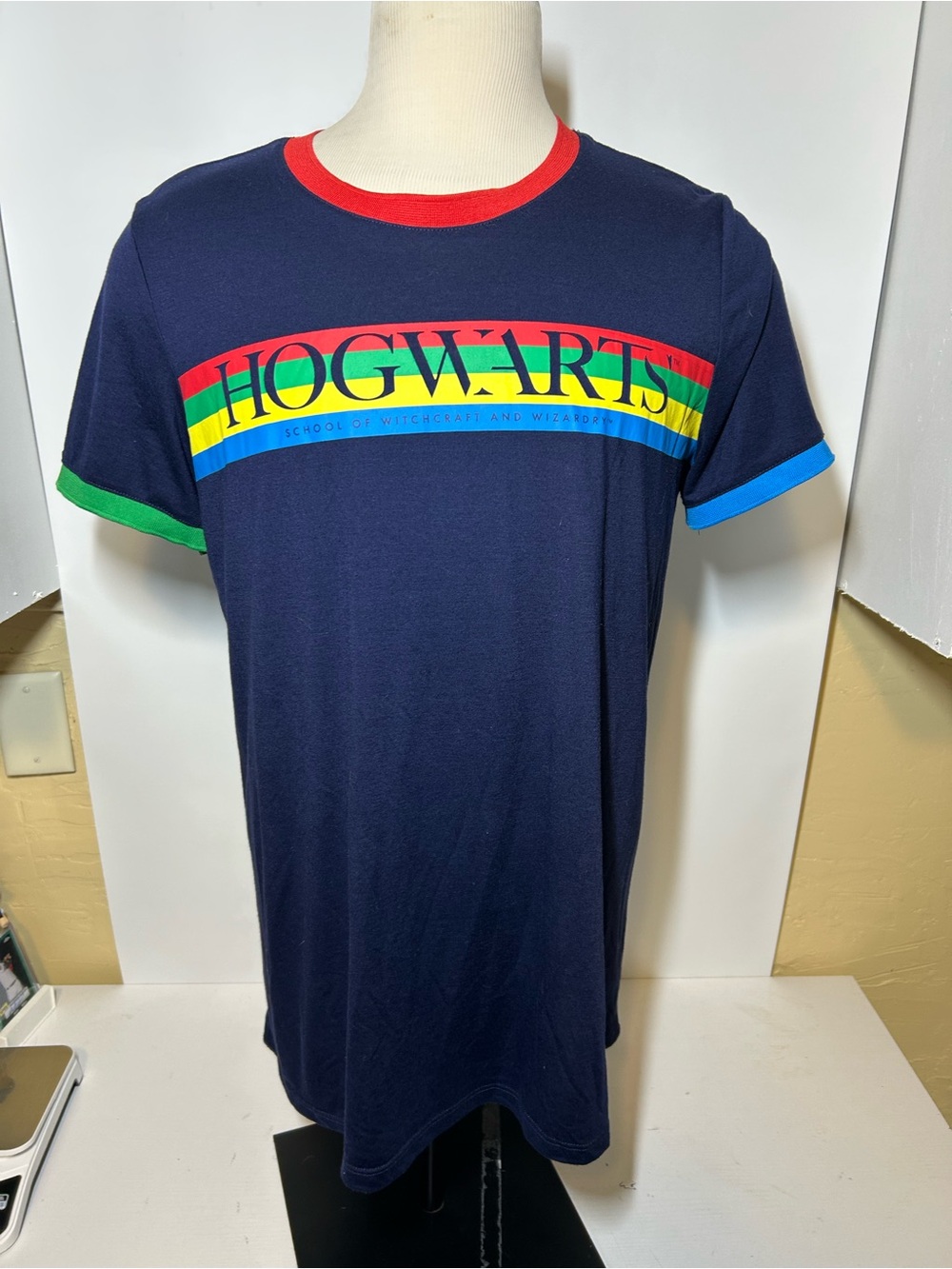 Warner Bros. Navy Tee with Rainbow Hogwarts Graphic
